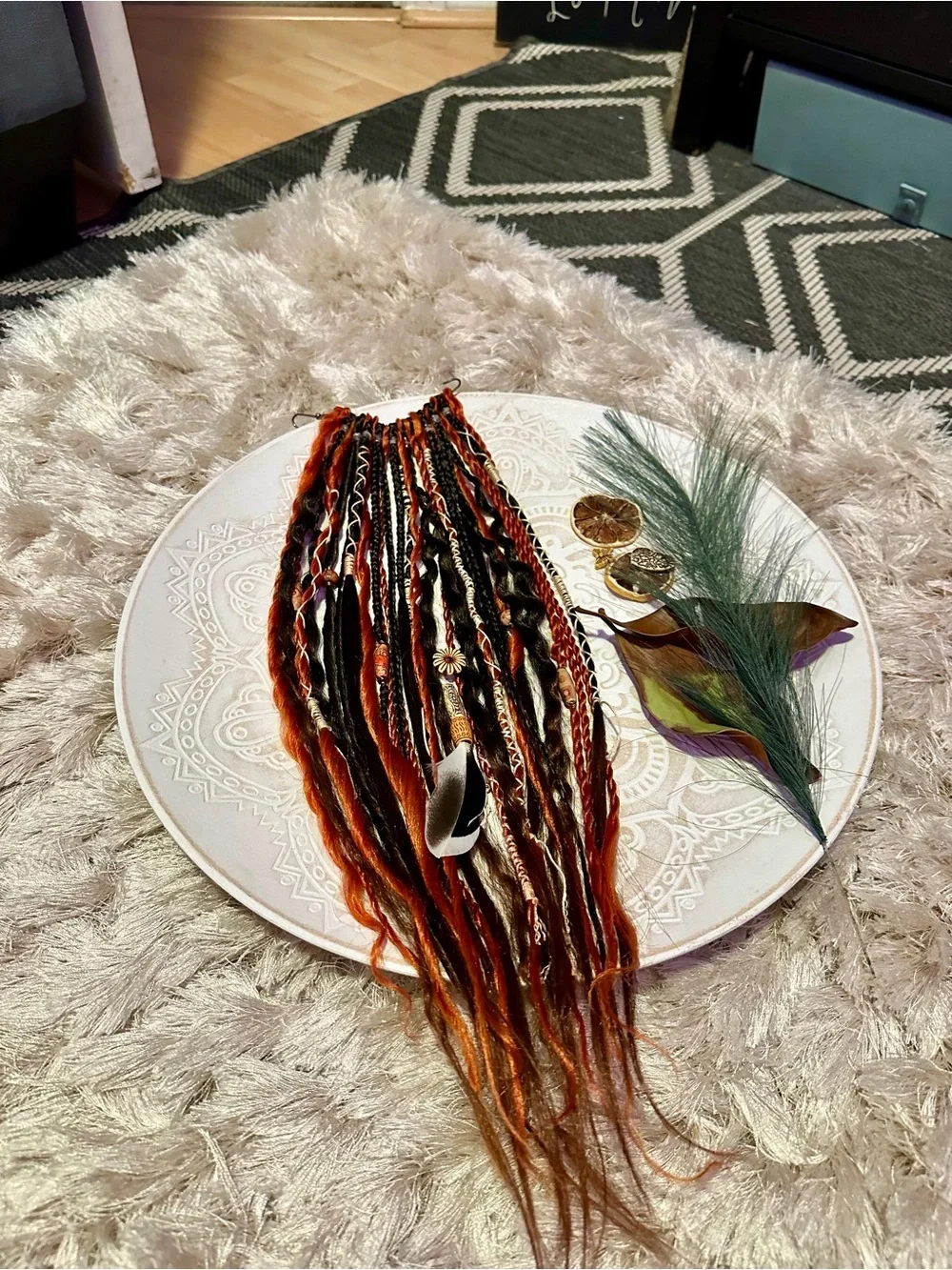 Blonde Hair Extensions with Black and Orange Braided Accents